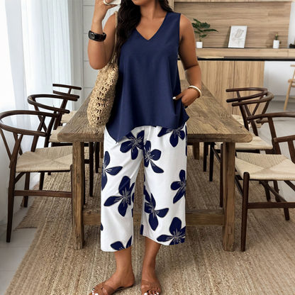 🌸 NUR FÜR KURZE ZEIT: 55 % RABATT! ✨ Set aus asymmetrischem Damenoberteil und Caprihose mit Blumenmuster – vielseitig, farbenfroh, bequem 🌺